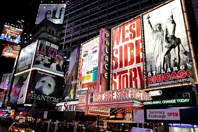 Times Square lit with neon signs at night